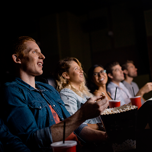 People watching movies in a movie theater