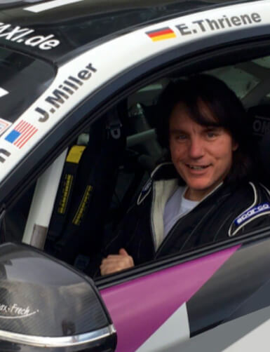 Sim racer Mark Puc sits in a race car